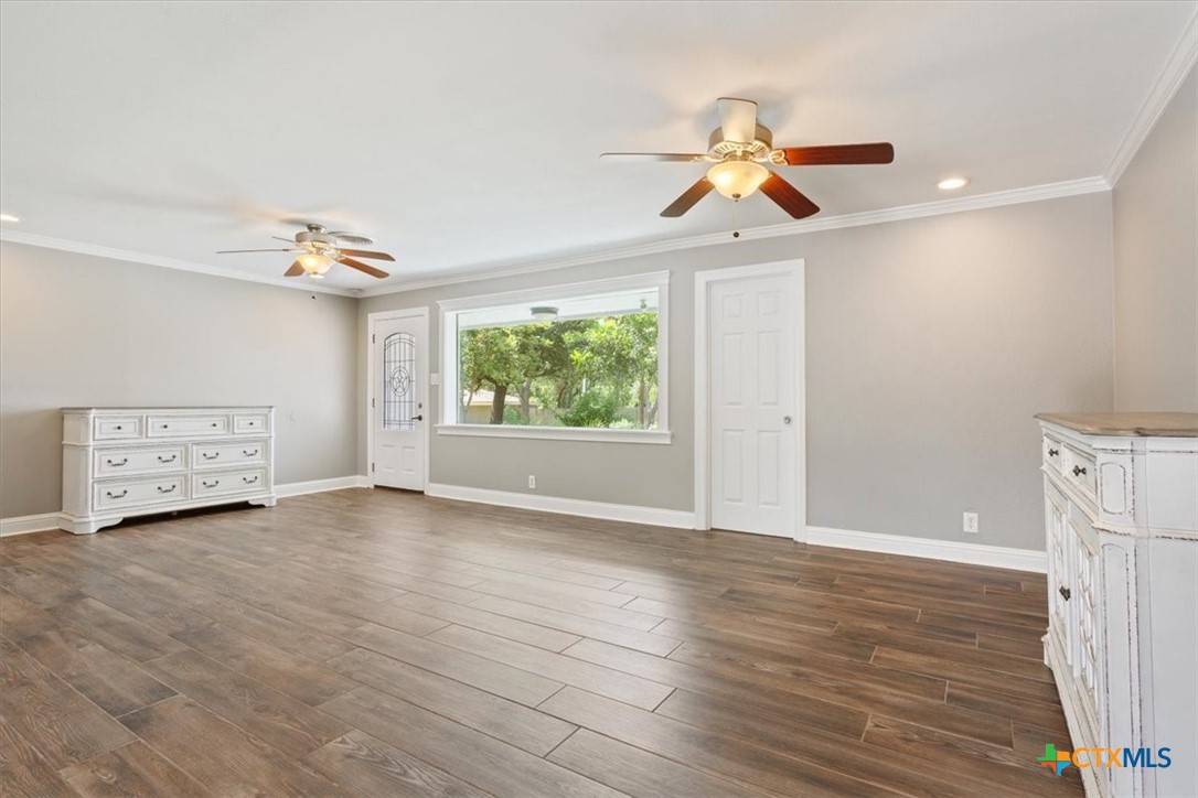 2810 Lilac Lane Temple, TX 76502 - Photo 6 of 40 wooden floor in an empty room with a window