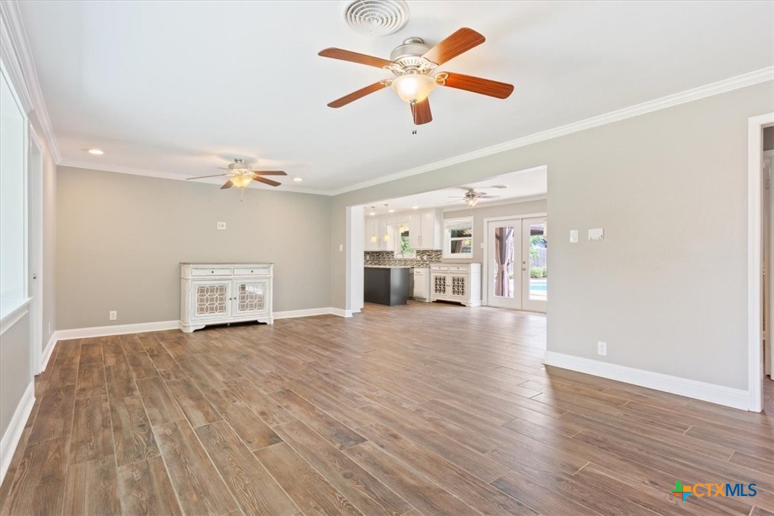2810 Lilac Lane Temple, TX 76502 - Photo 7 of 40 wooden floor in an empty room with a window
