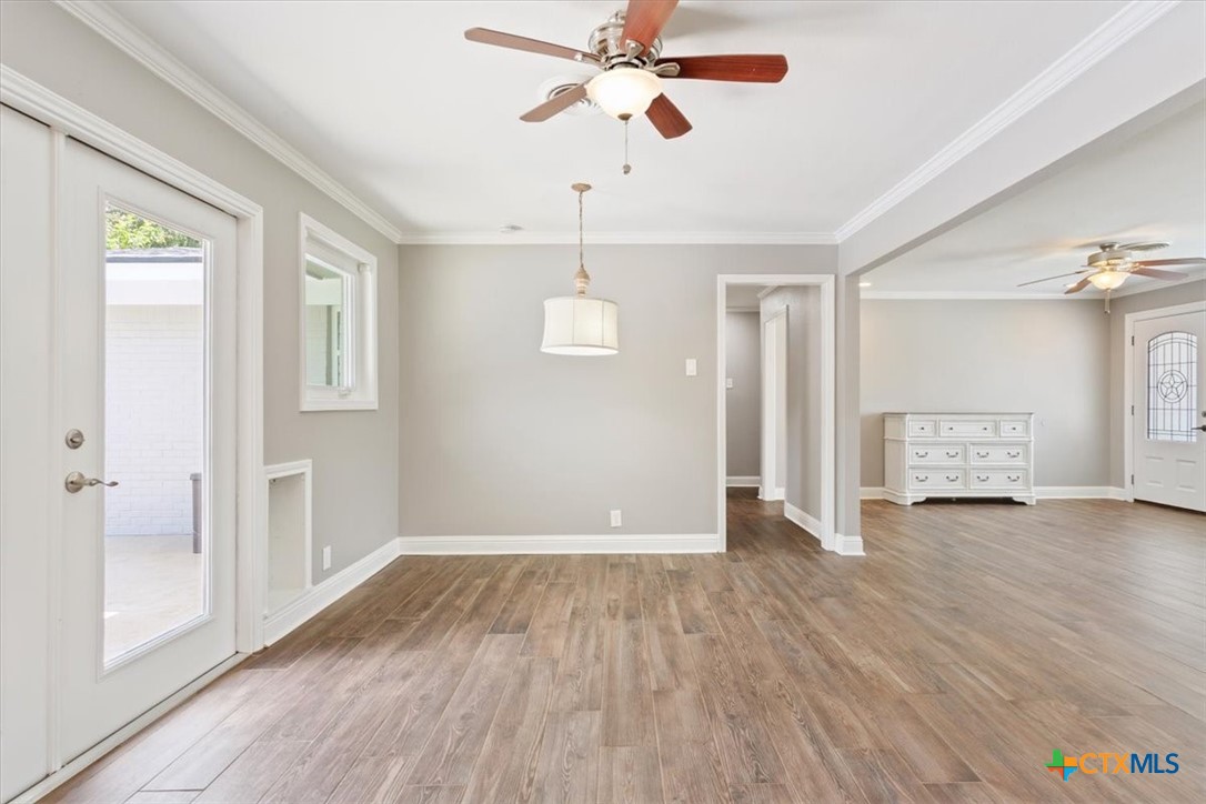2810 Lilac Lane Temple, TX 76502 - Photo 9 of 40 wooden floor in an empty room with a window