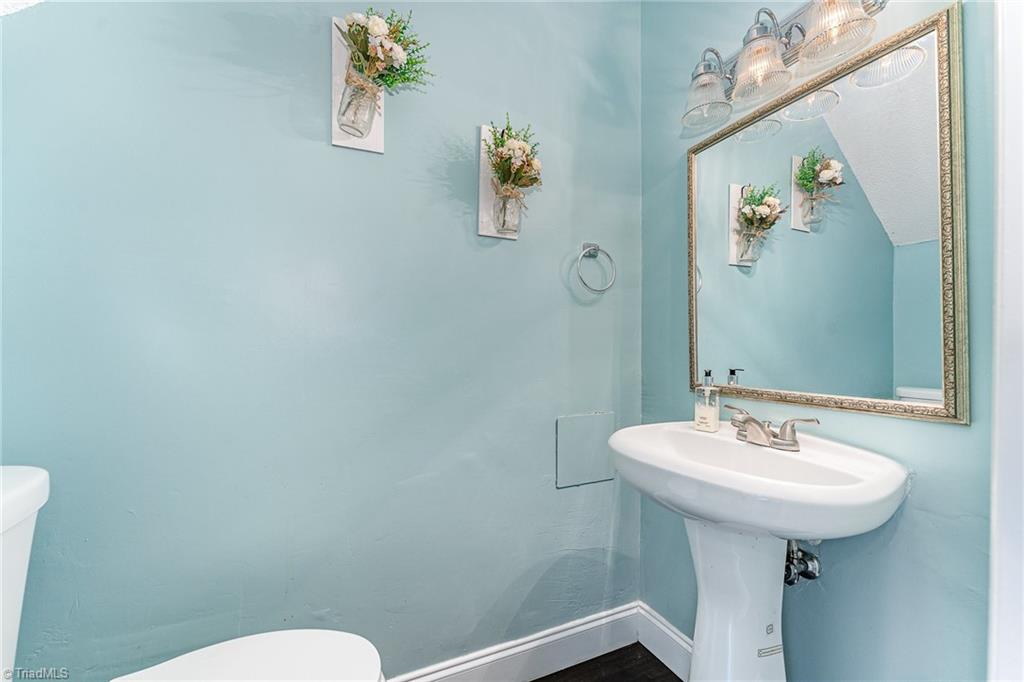 4721 Tower Road Greensboro, NC 27410 - Photo 19 of 40 Main floor half bath