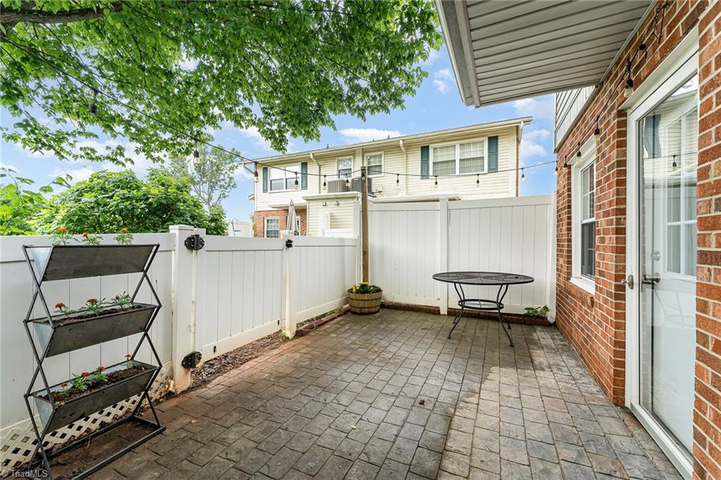 4721 Tower Road Greensboro, NC 27410 - Photo 34 of 40 Spacious brick patio!