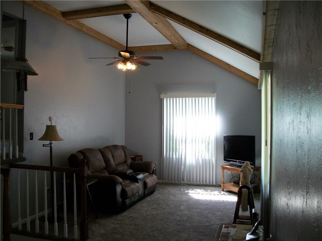 2094 Loucks Road Scottdale, PA 15683 - Photo 5 of 18 Cathedral ceilings, new carpet and freshly painted living room