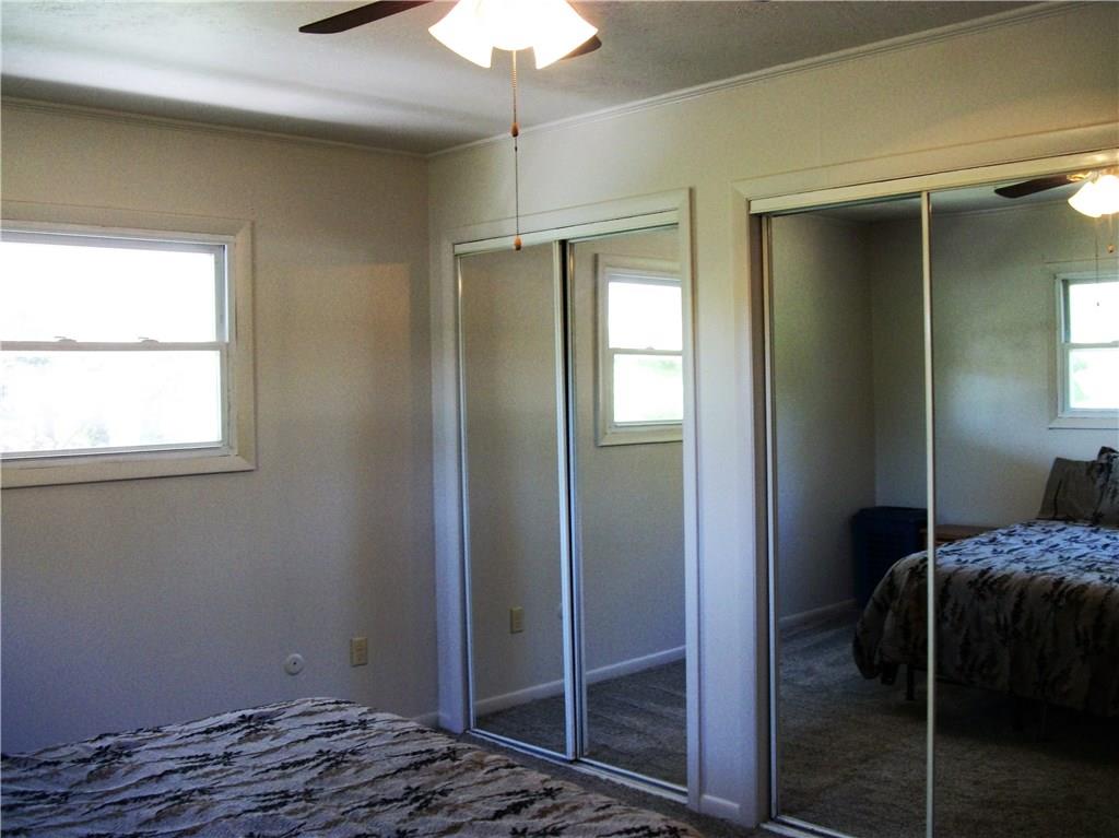 2094 Loucks Road Scottdale, PA 15683 - Photo 8 of 18 The master bedroom offers his and her closets