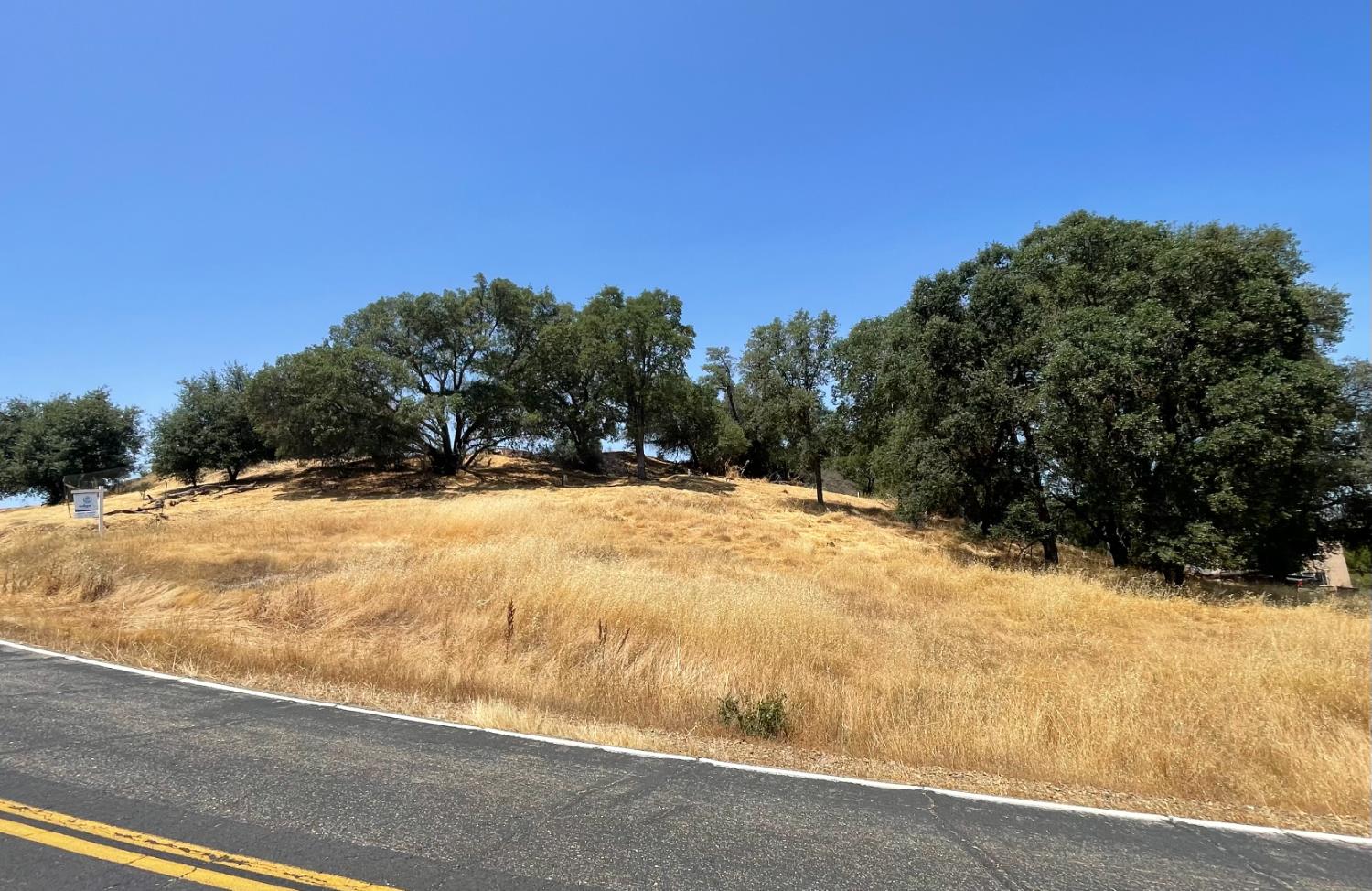 4585 Roadrunner Drive Ione, CA 95640 - Photo 13 of 26 a view of a yard covered with snow