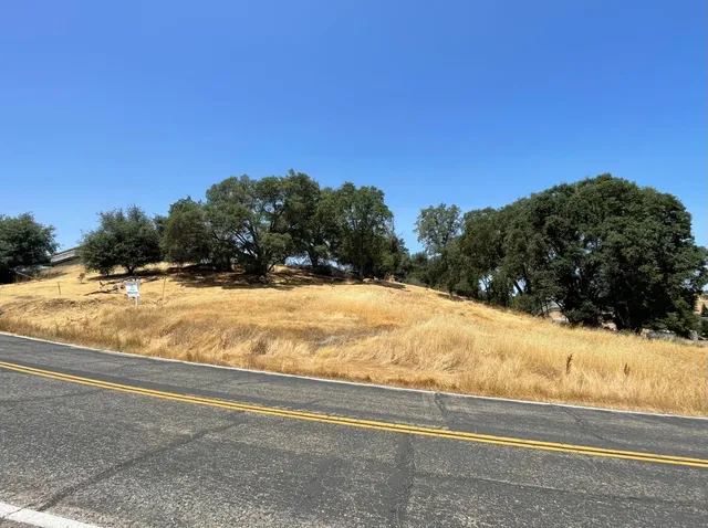 a view of swimming pool next to a yard