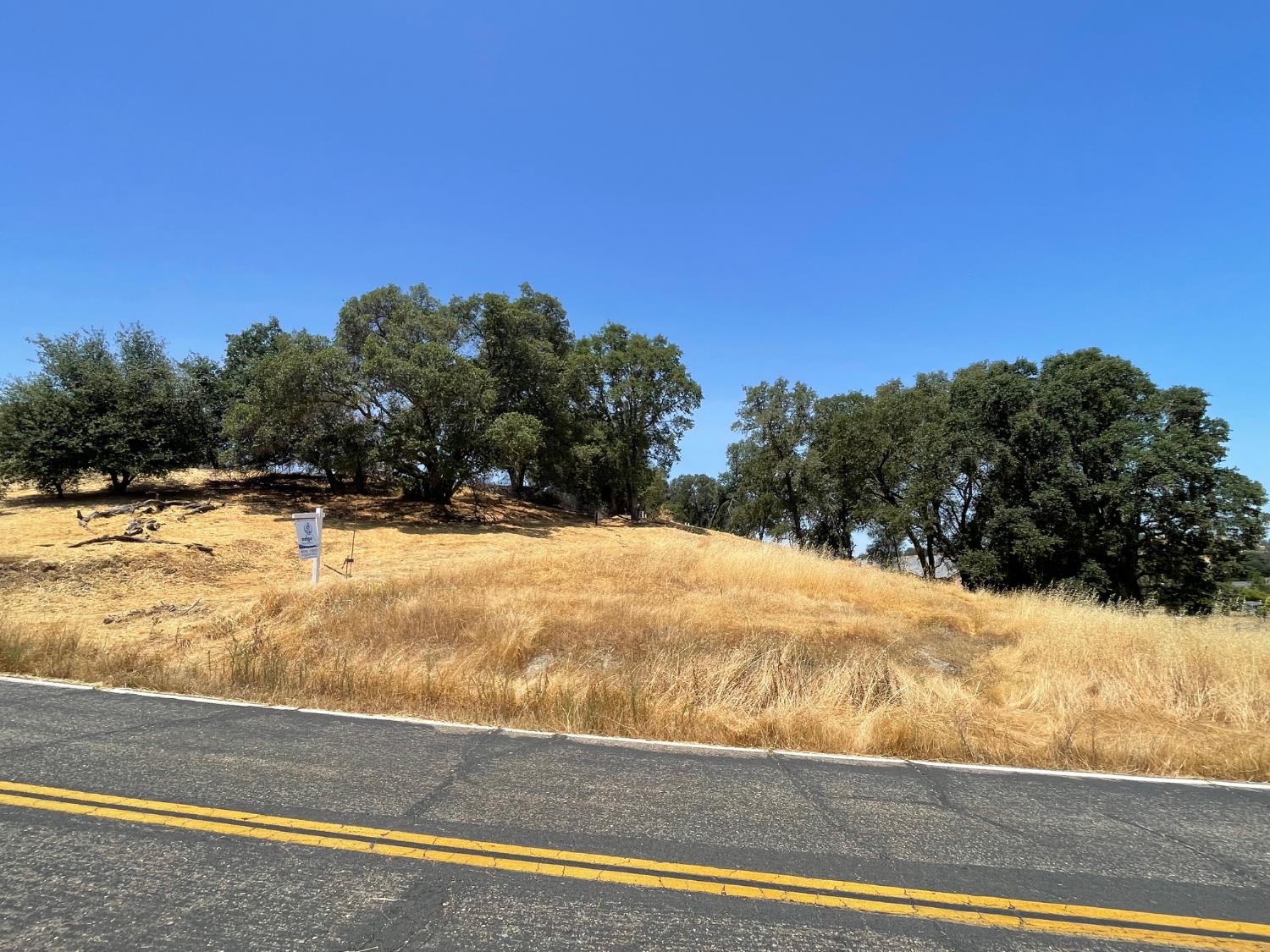 4585 Roadrunner Drive Ione, CA 95640 - Photo 25 of 26 a view of a yard with a house