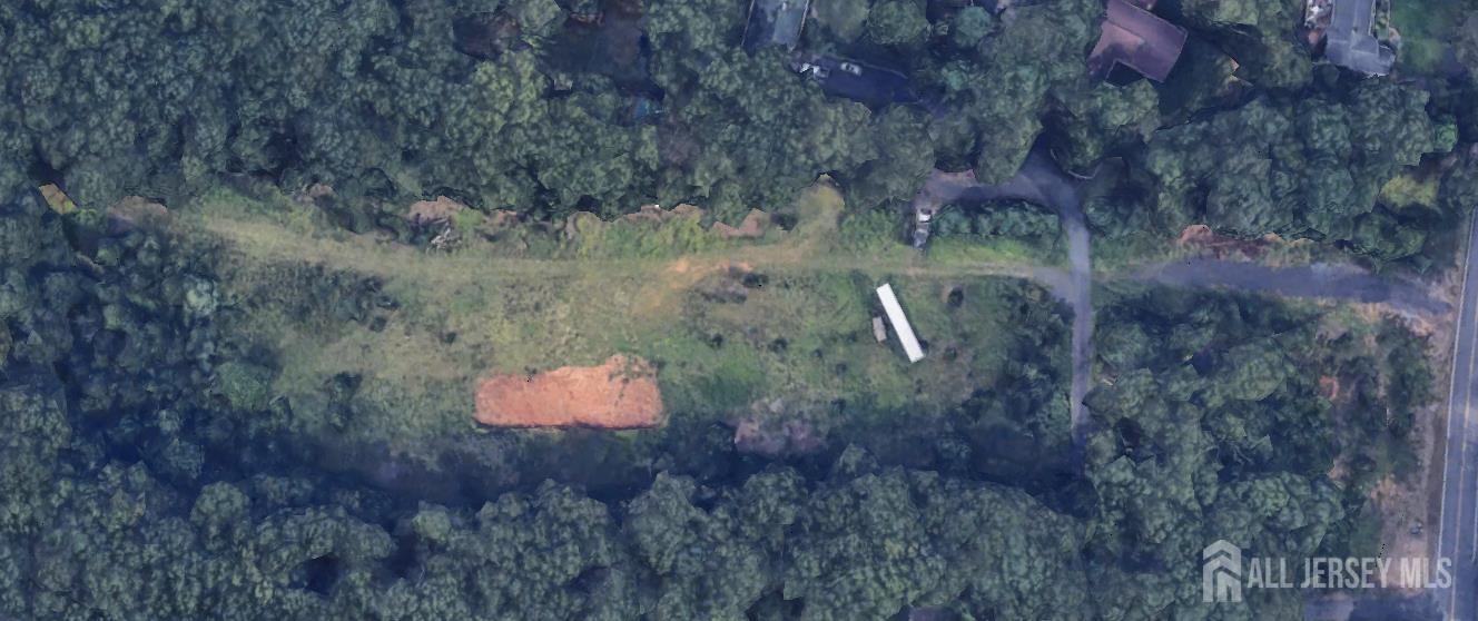 4 Adda Court Monmouth Junction, NJ 08852 - Photo 2 of 2 a backyard of a house with lots of green space and trees