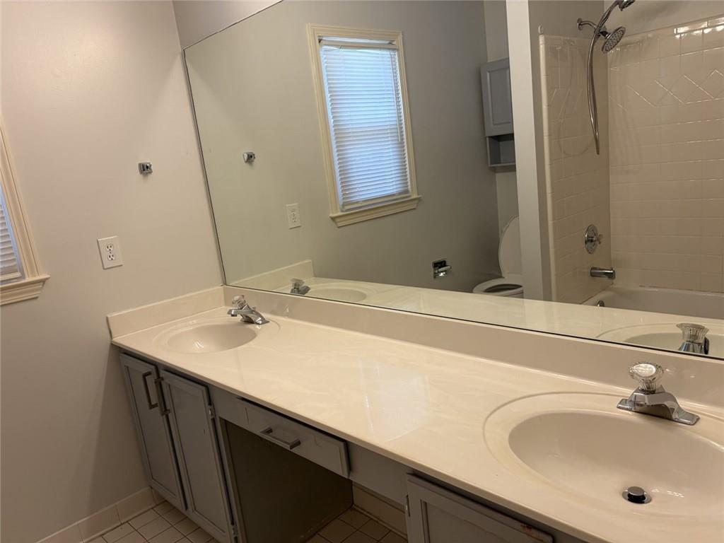 3089 Commons Crossing Snellville, GA 30078 - Photo 9 of 16 a bathroom with a sink and a mirror