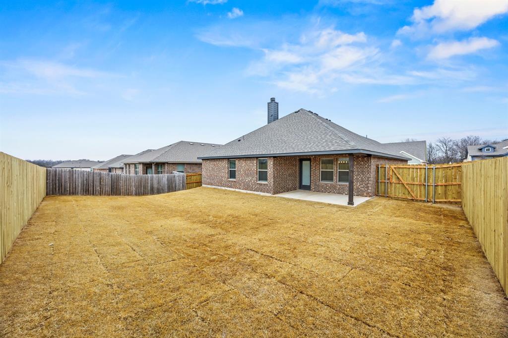 104 Maverick Trail Valley View, TX 76272 - Photo 28 of 30 a house with swimming pool in front of it