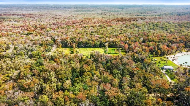 a view of a field with an outdoor space