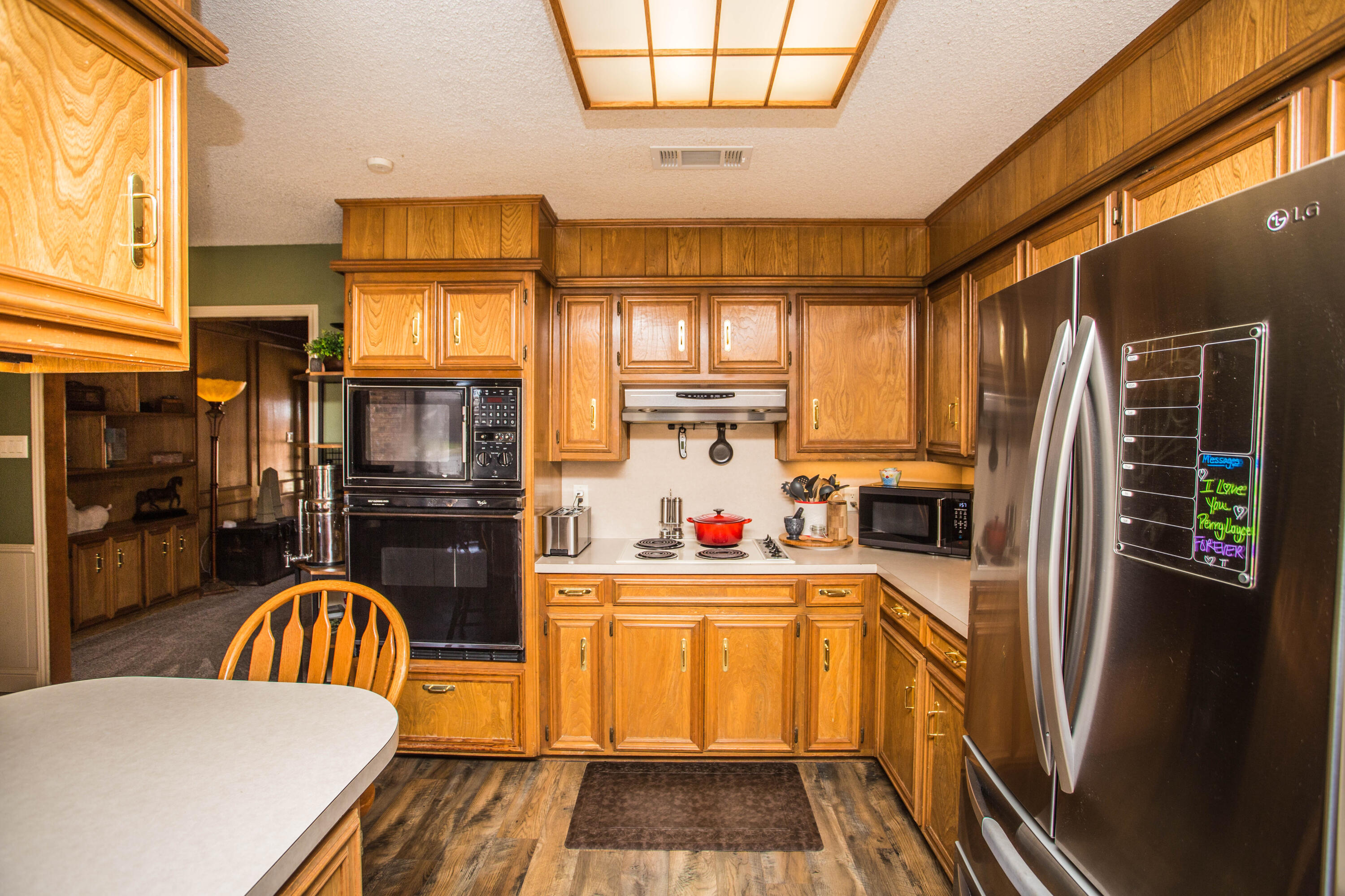 5202 85th Street Lubbock, TX 79424 - Photo 21 of 40 a kitchen that has a sink a window and stainless steel appliances