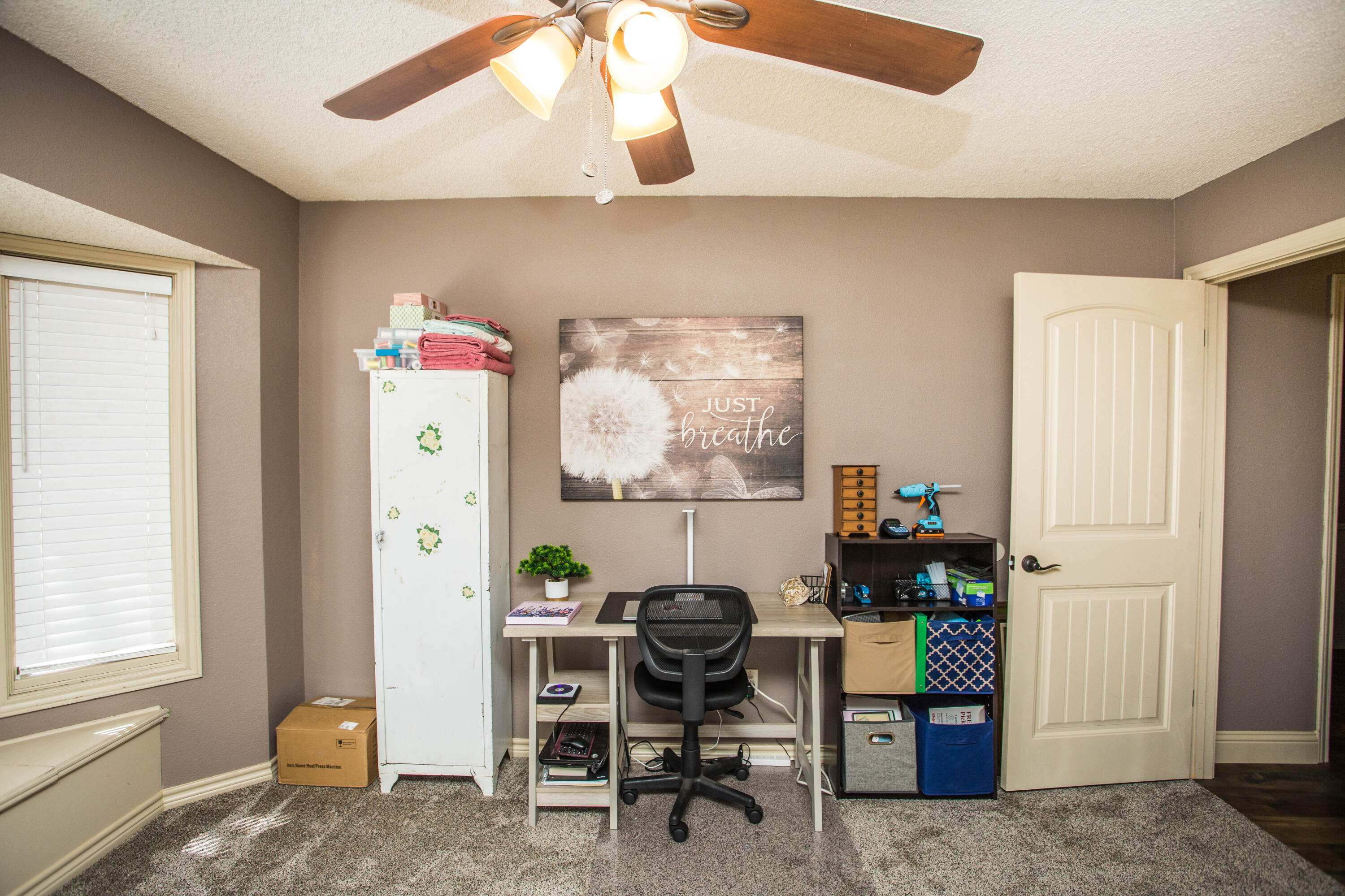 5202 85th Street Lubbock, TX 79424 - Photo 10 of 40 a work room with furniture and a window