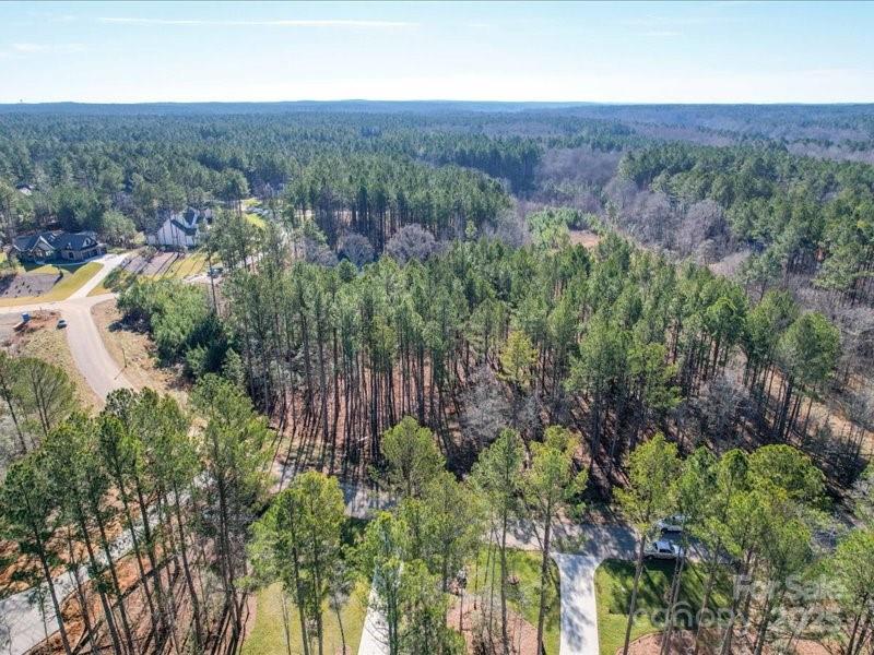 8090 Gulf Crk Road, Unit 56 Lancaster, SC 29720 - Photo 17 of 35 an aerial view of residential house with outdoor space and trees all around