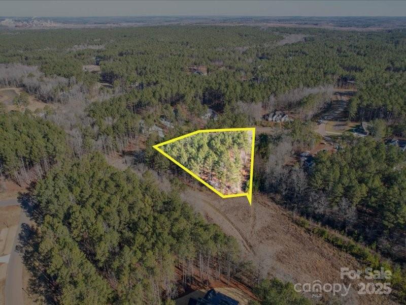 8090 Gulf Crk Road, Unit 56 Lancaster, SC 29720 - Photo 2 of 35 an aerial view of a house with a yard