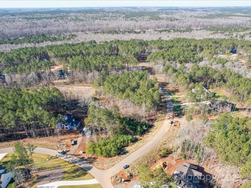 8090 Gulf Crk Road, Unit 56 Lancaster, SC 29720 - Photo 22 of 35 a view of a city with lush green forest