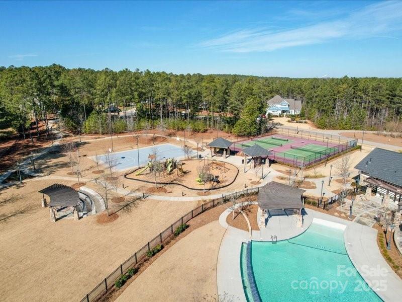 8090 Gulf Crk Road, Unit 56 Lancaster, SC 29720 - Photo 9 of 35 a view of a swimming pool with lounge chairs