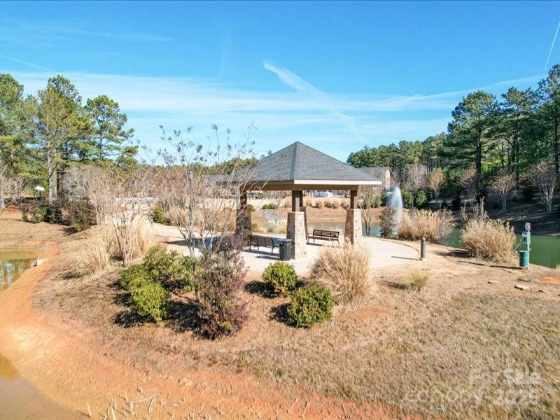 8090 Gulf Crk Road, Unit 56 Lancaster, SC 29720 - Photo 10 of 35 a view of a house with a yard covered in snow