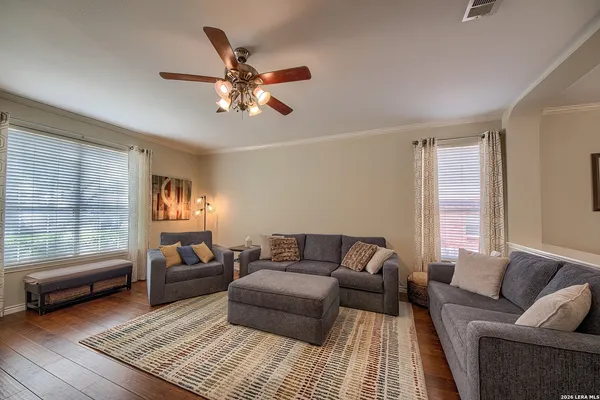 a living room with furniture and a window