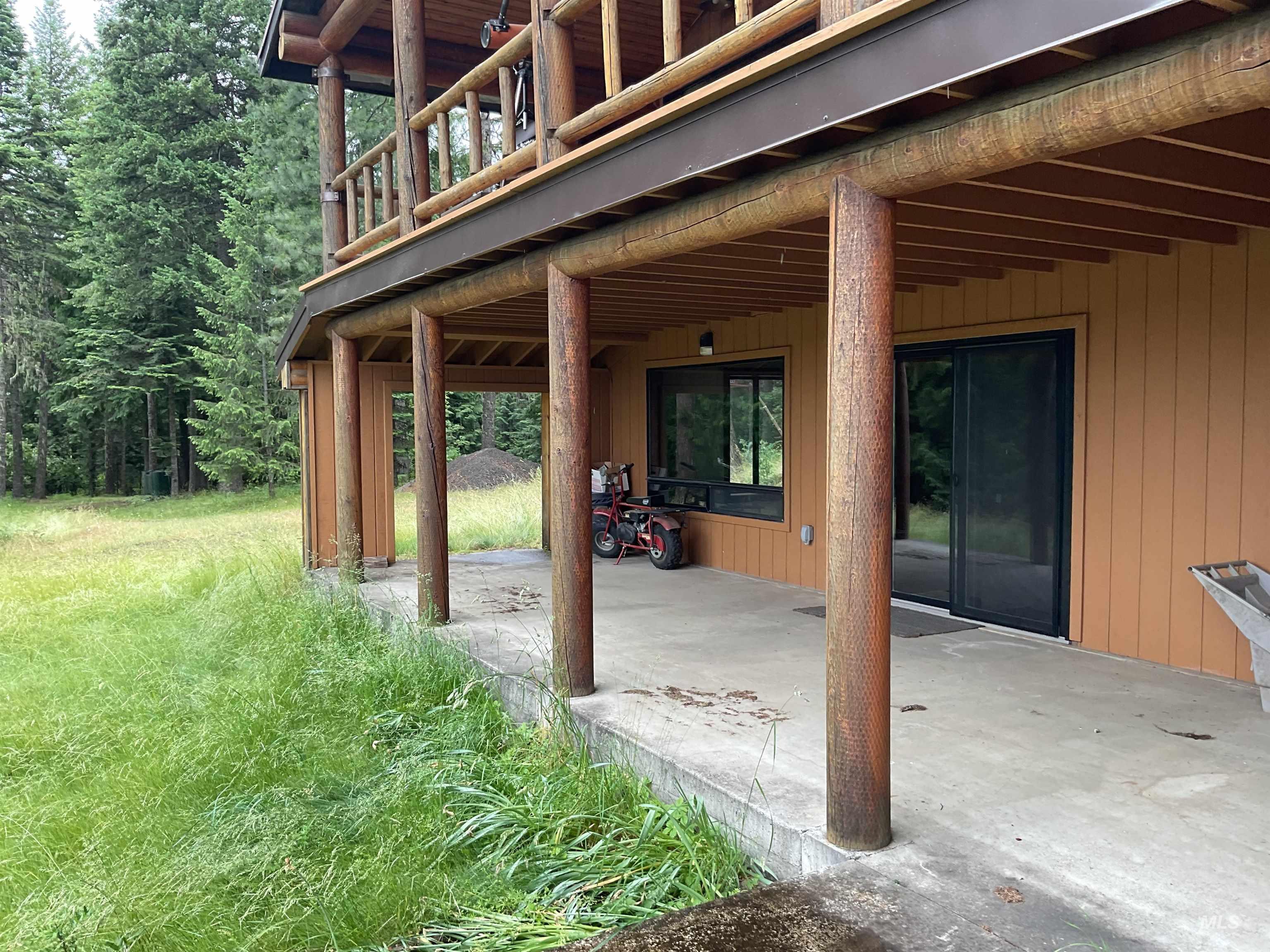 6125 Freeman Creek Road Lenore, ID 83541 - Photo 41 of 44 Dedicated utility space featuring a water filtration system, water softener, electrical panel, and forced-air HVAC unit