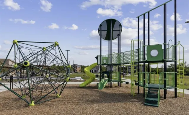 a front view of a house with outdoor space and outdoor seating