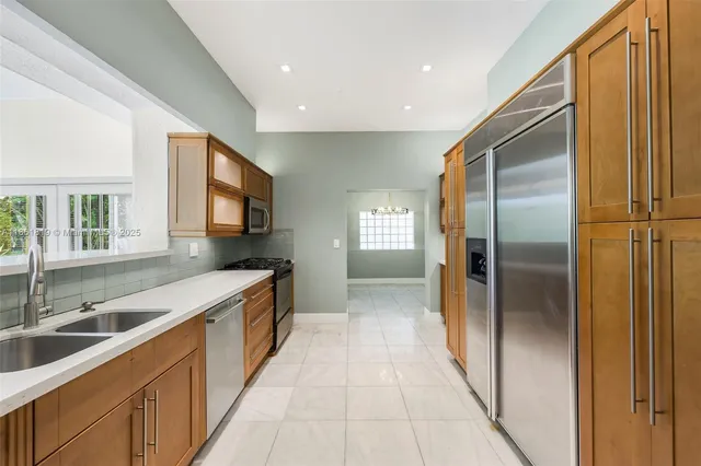 a bedroom with a bed and a potted plant