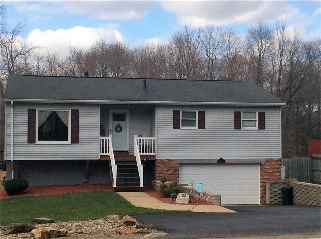 132 West McQuistion Road Butler, PA 16001 - Photo 1 of 20 BEAUTIFULLY LANDSCAPED, WITH PAVED DRIVE - FRONT EXTERIOR OF HOME.