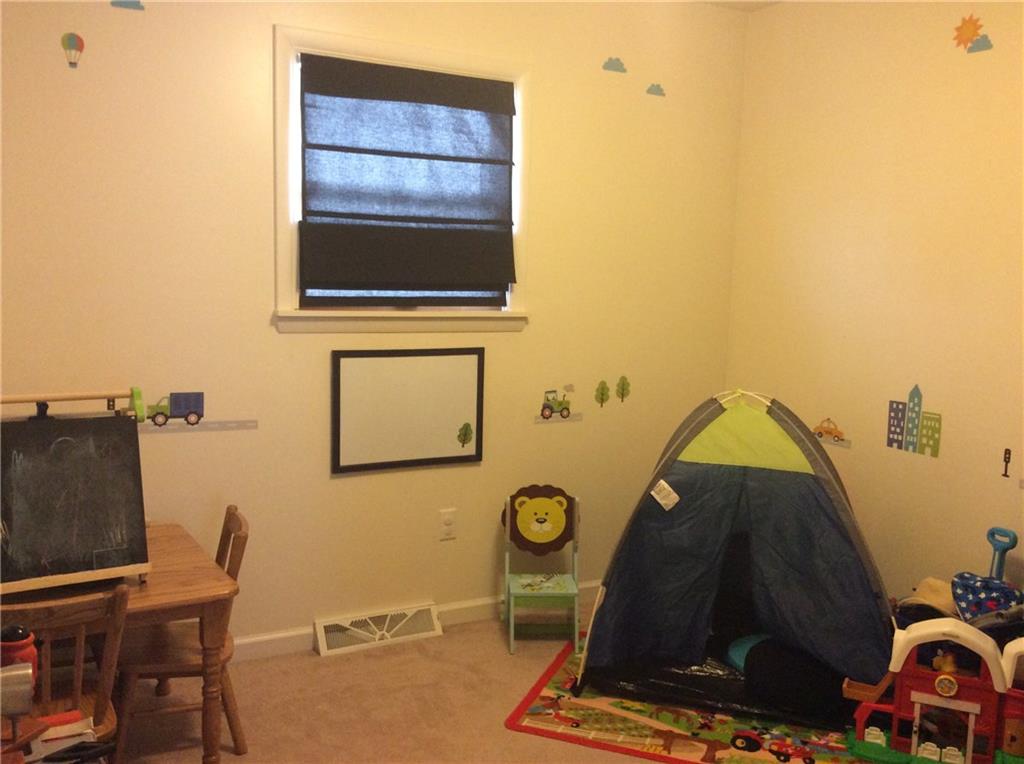 132 West McQuistion Road Butler, PA 16001 - Photo 12 of 20 3RD BEDROOM, CURRENTLY USED AS A PLAYROOM.