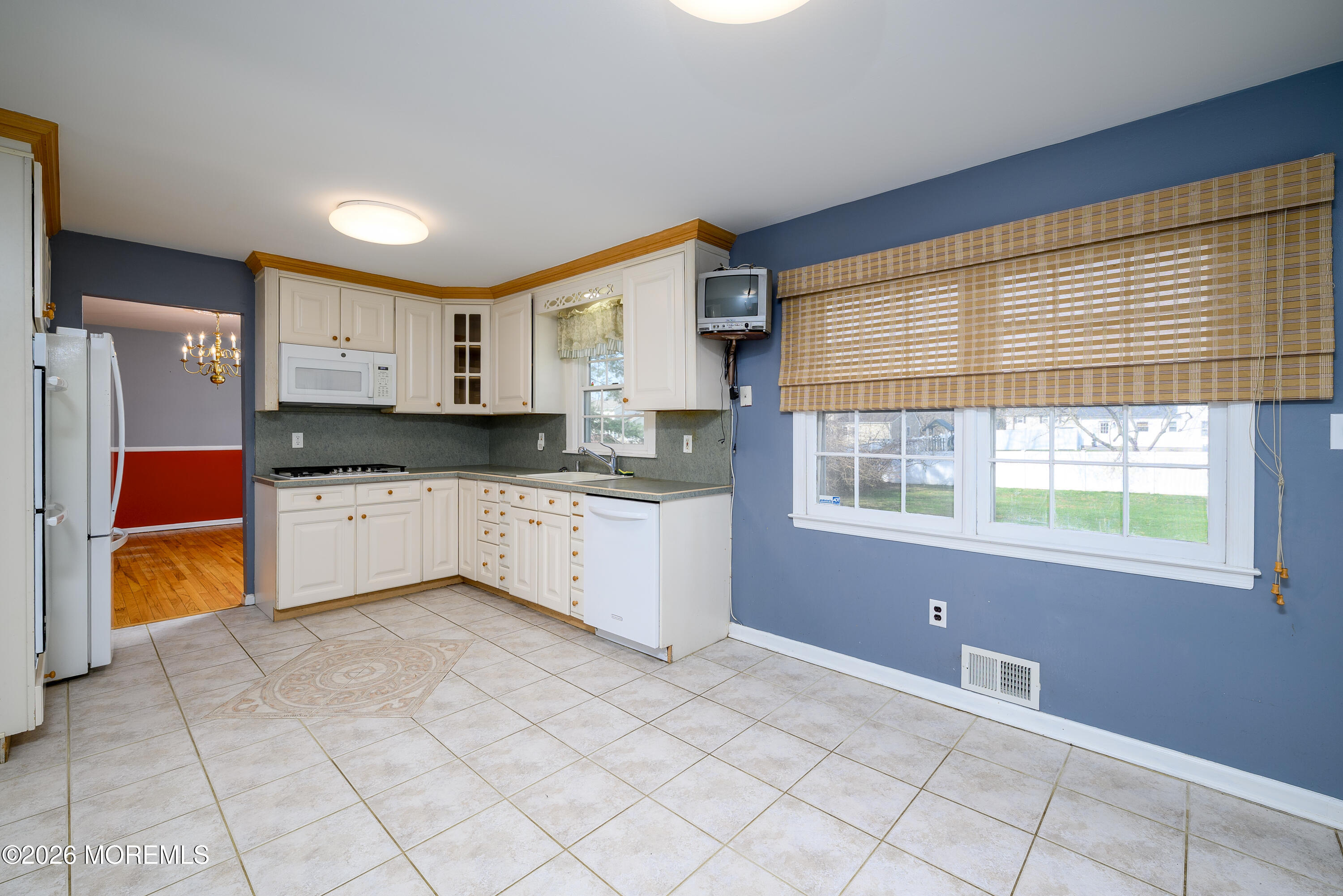 821 Middletown-Lincroft Road Middletown, NJ 07748 - Photo 14 of 42 a large kitchen with a cabinets