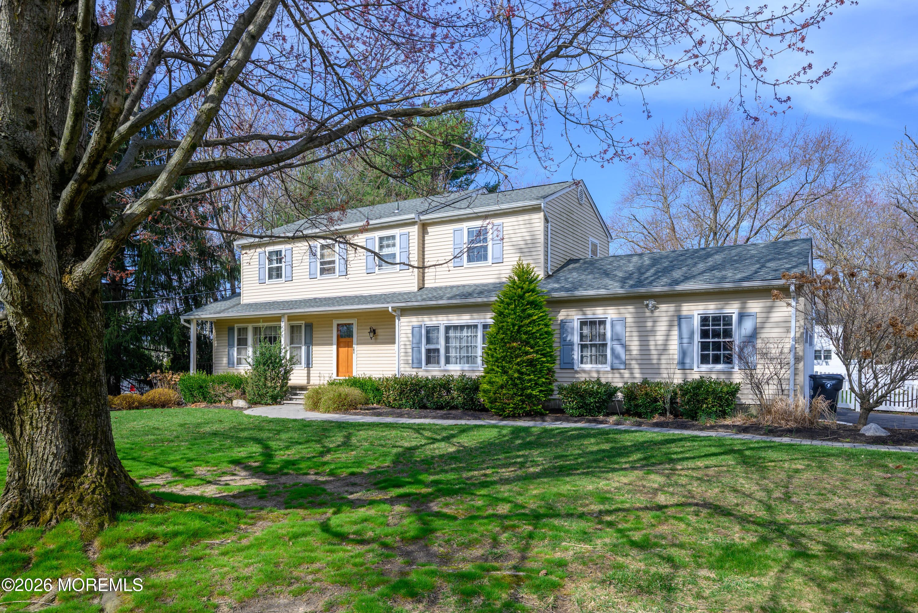 821 Middletown-Lincroft Road Middletown, NJ 07748 - Photo 2 of 42 a front view of a house with garden