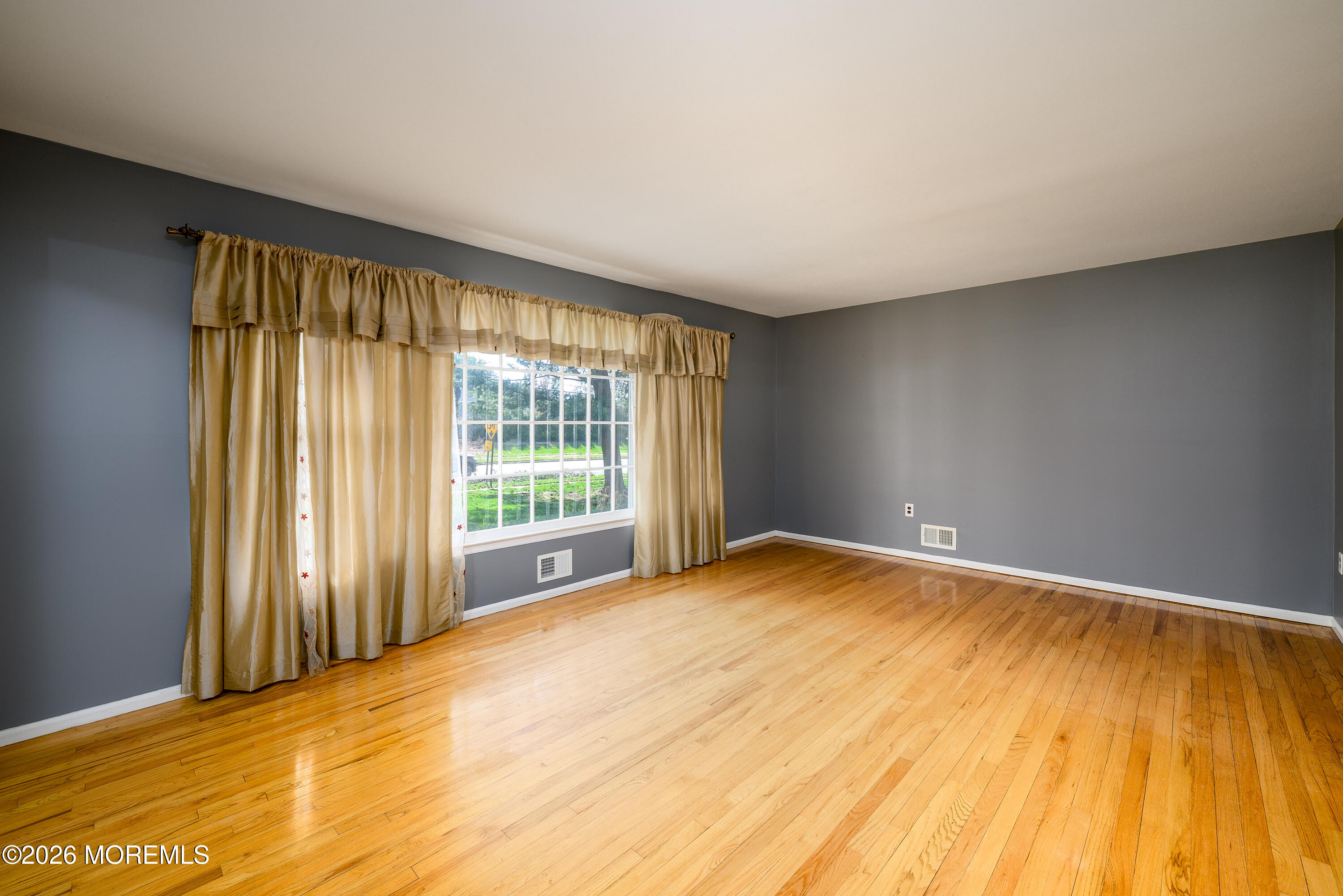 821 Middletown-Lincroft Road Middletown, NJ 07748 - Photo 23 of 42 a view of an empty room with a window