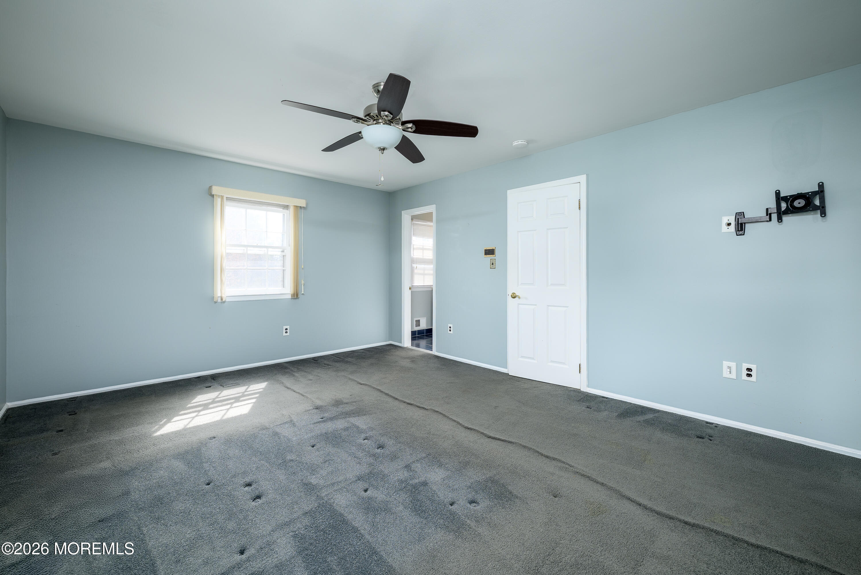 821 Middletown-Lincroft Road Middletown, NJ 07748 - Photo 25 of 42 a view of an empty room with a window