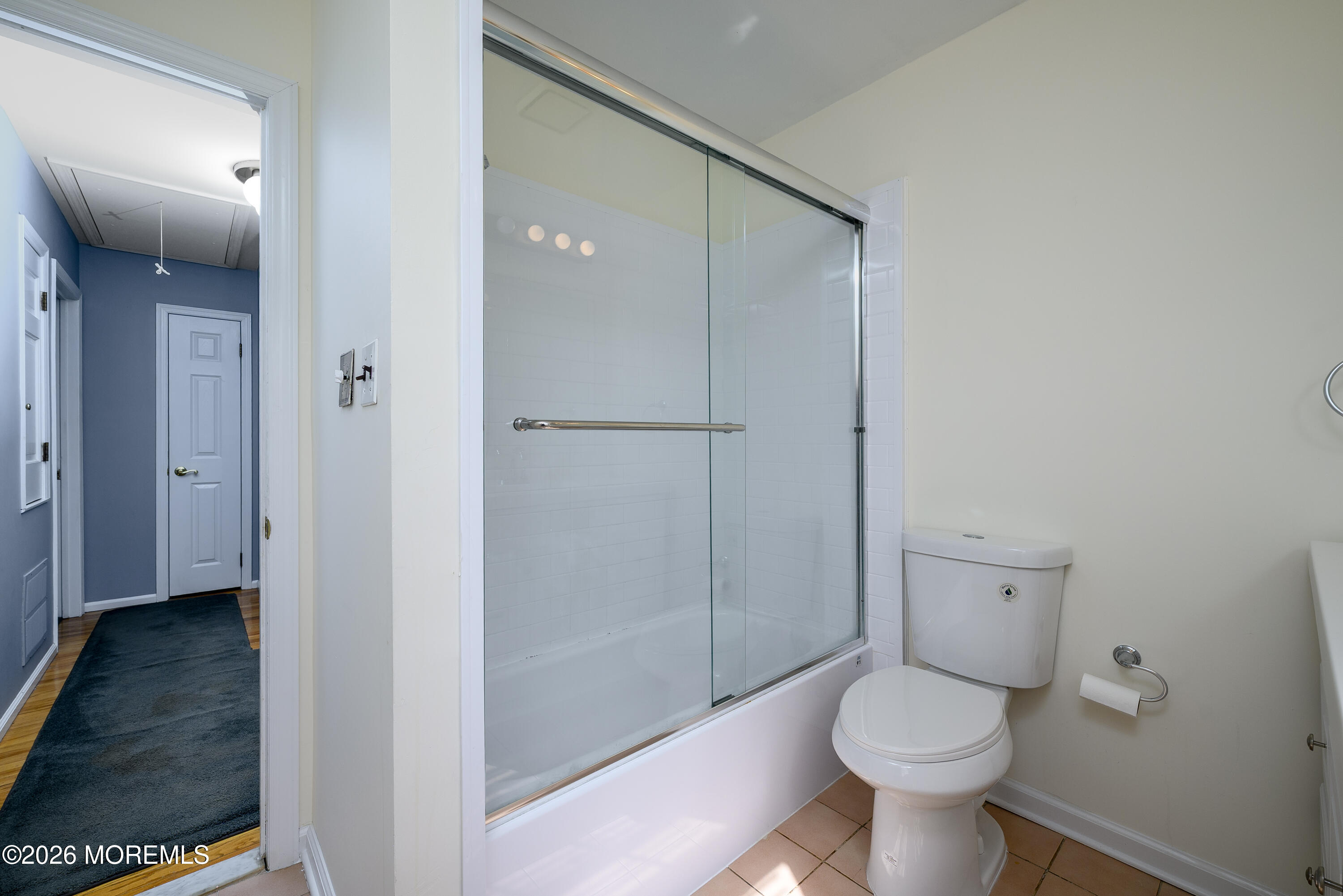 821 Middletown-Lincroft Road Middletown, NJ 07748 - Photo 33 of 42 a bathroom with a toilet and a shower