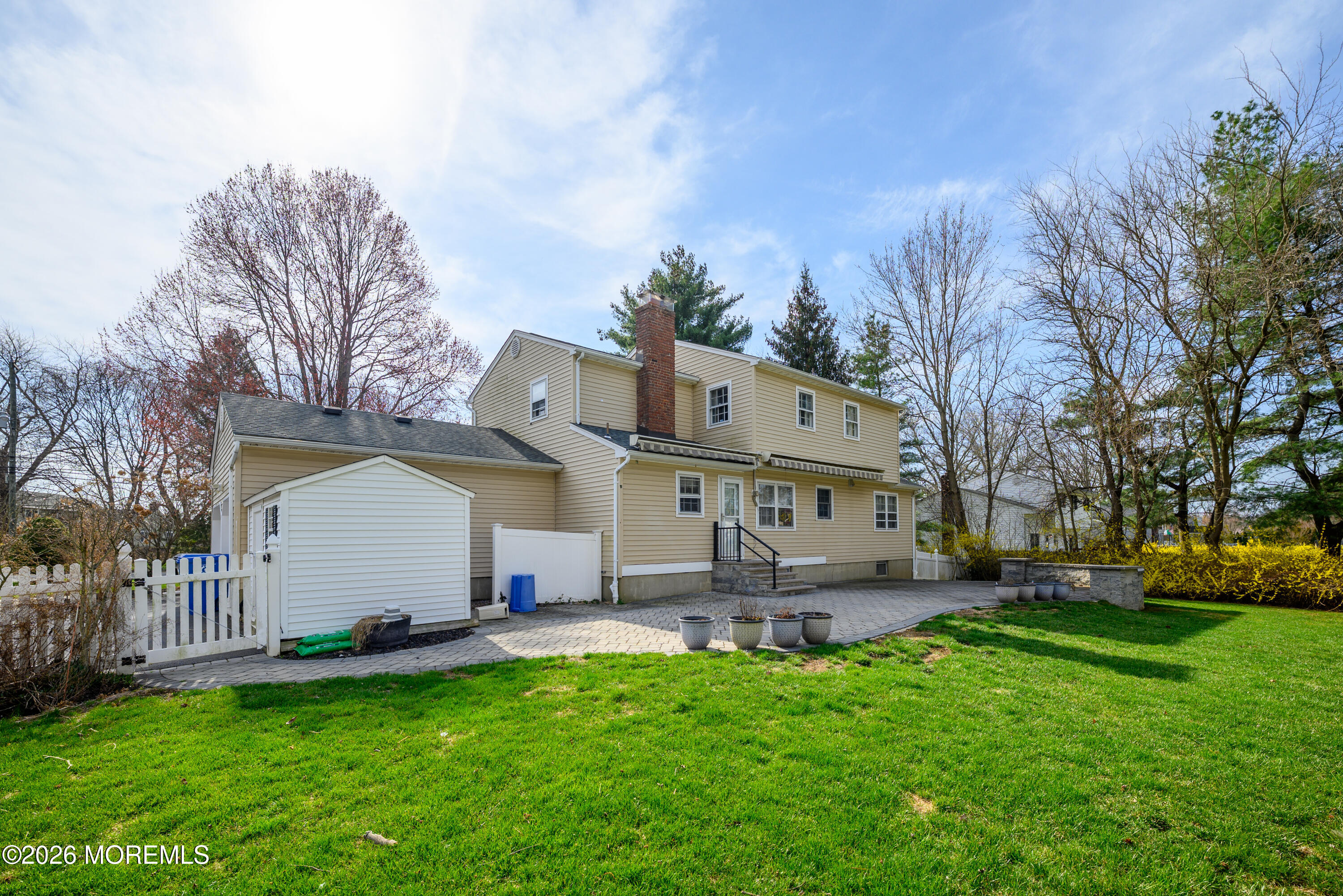 821 Middletown-Lincroft Road Middletown, NJ 07748 - Photo 4 of 42 a front view of house with yard and green space