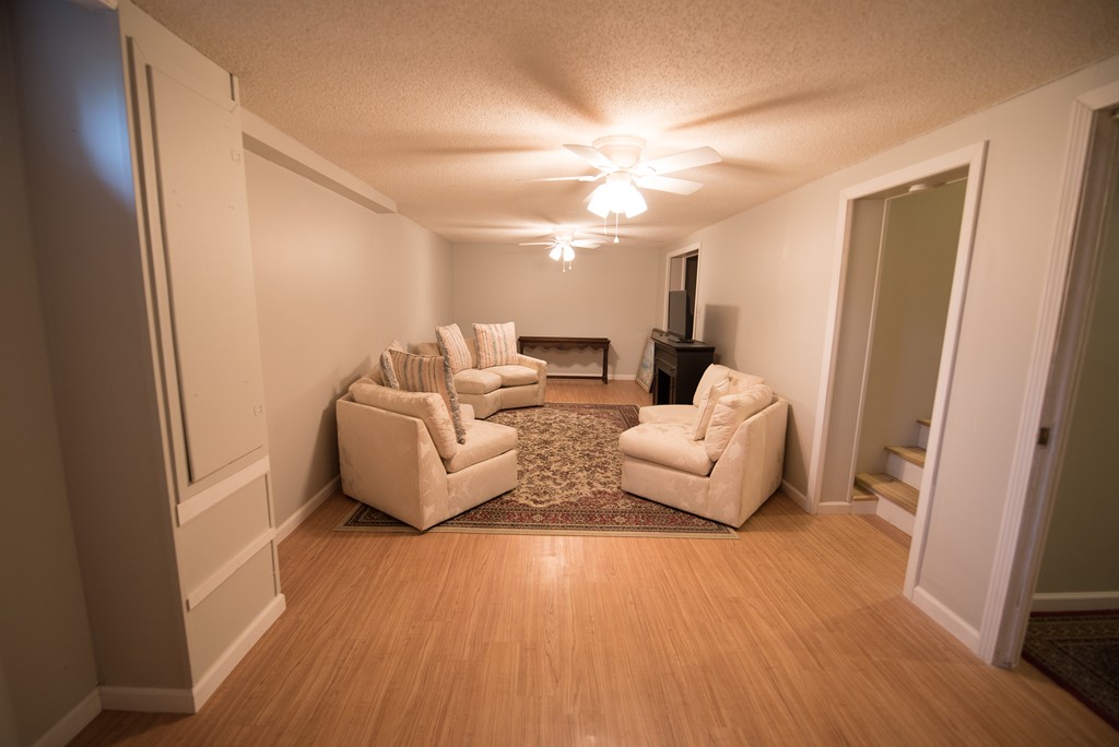 362 Stapleton Road Springfield, MA 01109 - Photo 17 of 24 a living room with furniture and a wooden floor