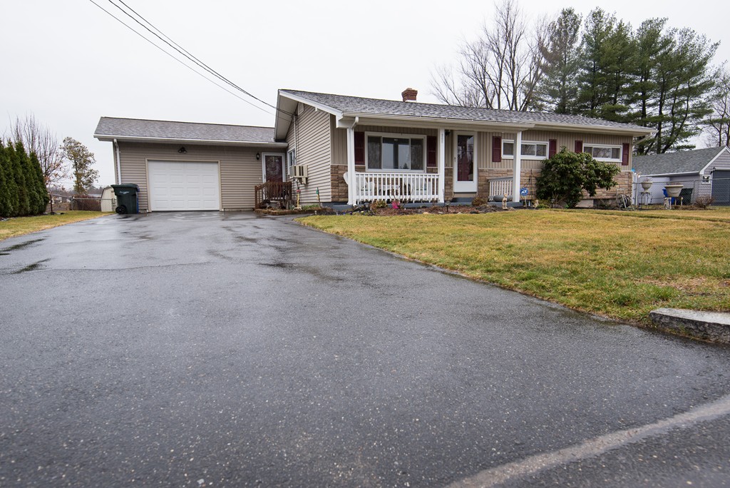 362 Stapleton Road Springfield, MA 01109 - Photo 2 of 24 a front view of a house with garden