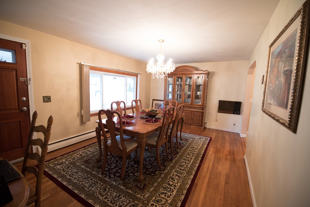 362 Stapleton Road Springfield, MA 01109 - Photo 8 of 24 a view of a dining room with furniture and wooden floor