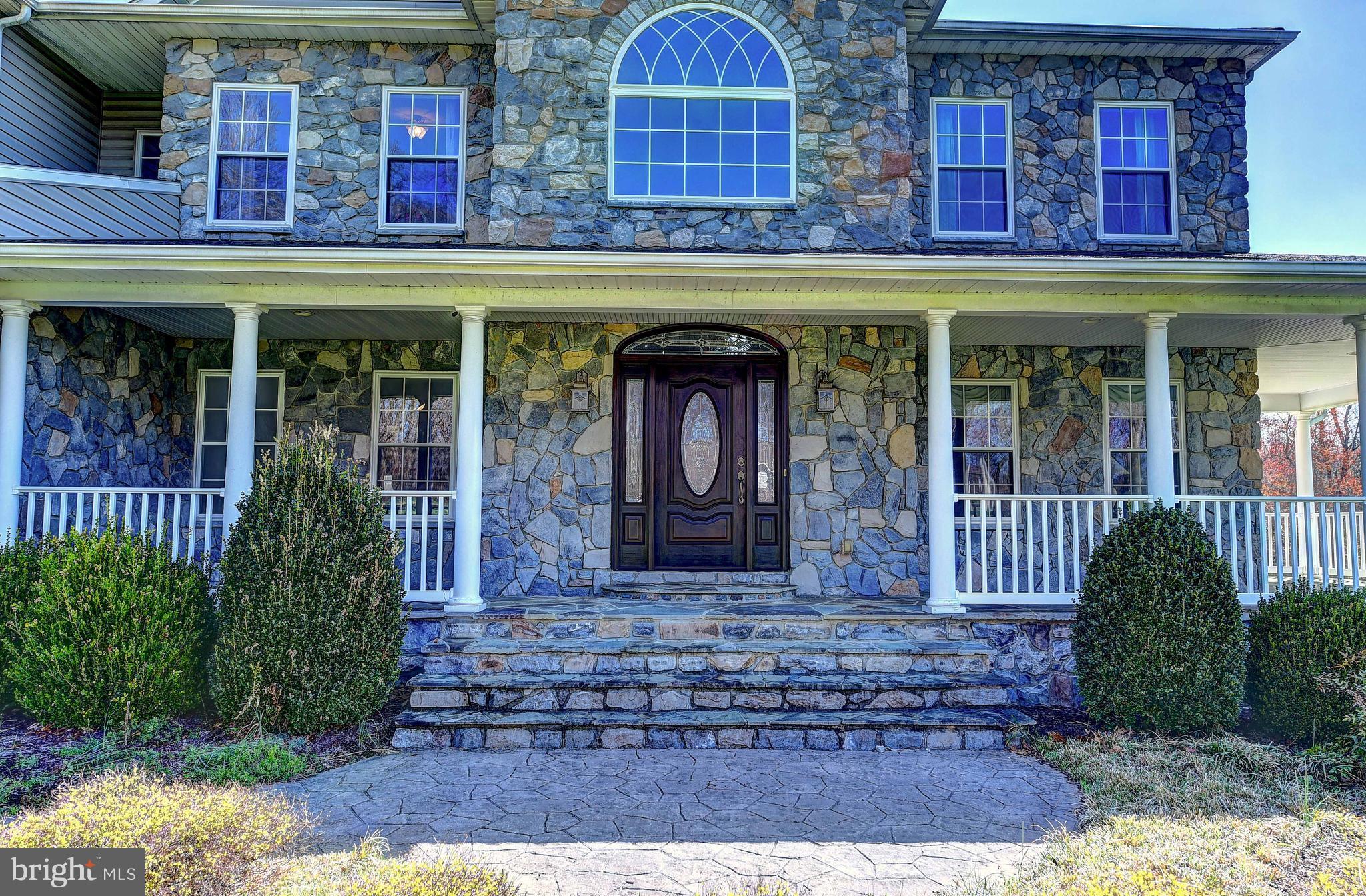 381 Davis Road Street, MD 21154 - Photo 3 of 30 Beautiful Stone Wrap Around Porch