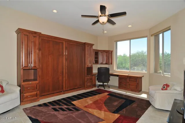 a bathroom with a sink a mirror and a shower