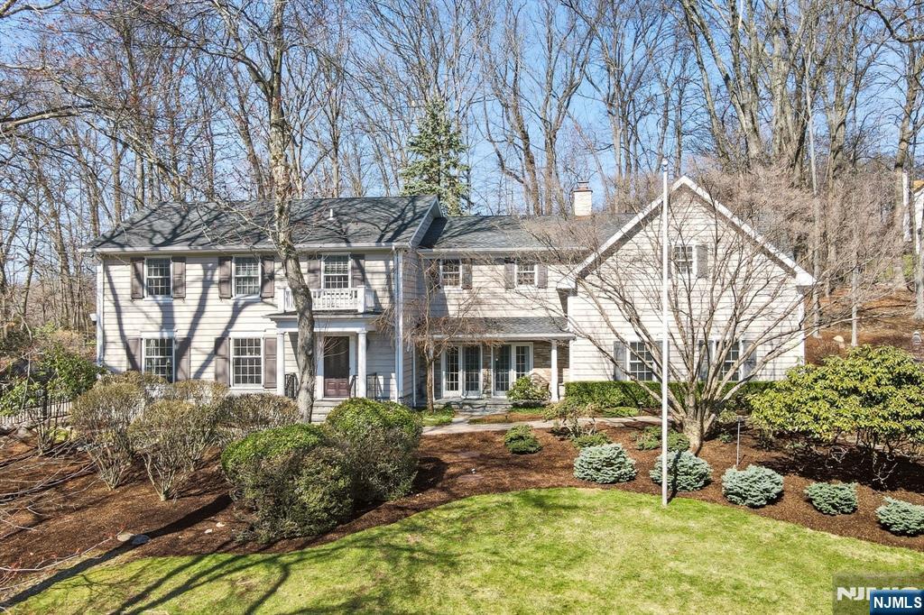 760 Rivenwood Road Franklin Lakes, NJ 07417 - Photo 1 of 48 a view of a house with a yard