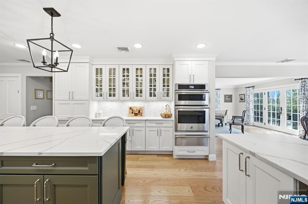 760 Rivenwood Road Franklin Lakes, NJ 07417 - Photo 11 of 48 a kitchen with a center island appliances and cabinets