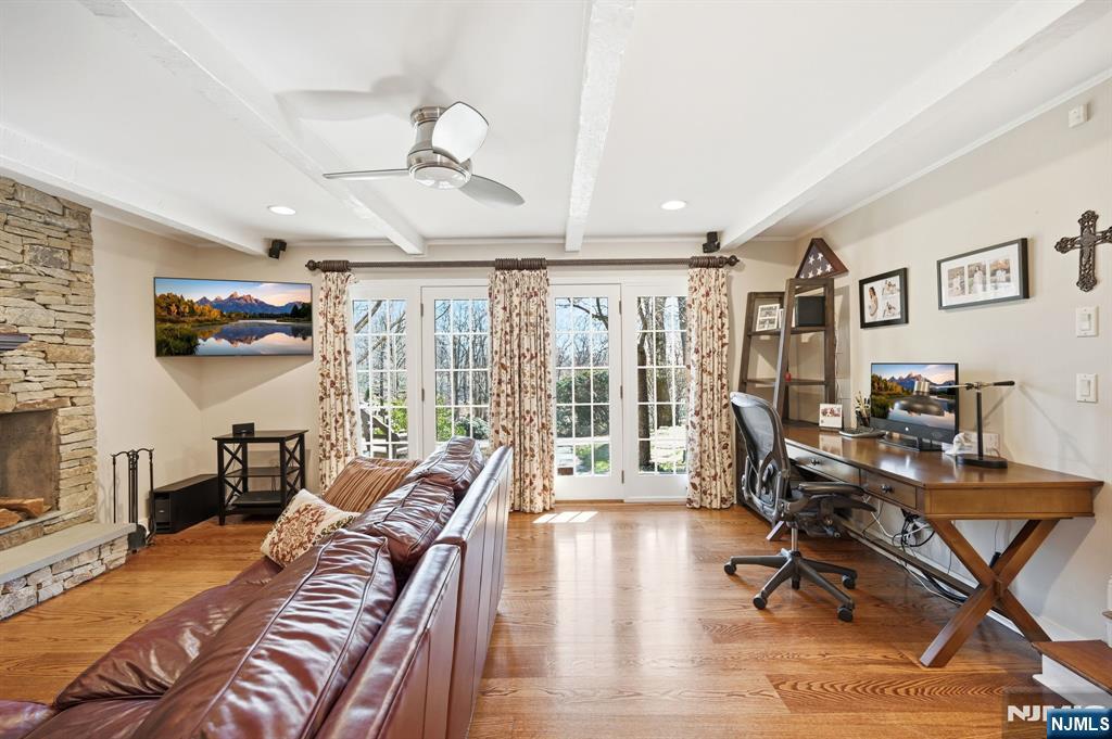 760 Rivenwood Road Franklin Lakes, NJ 07417 - Photo 13 of 48 a view of a livingroom with workspace and a window