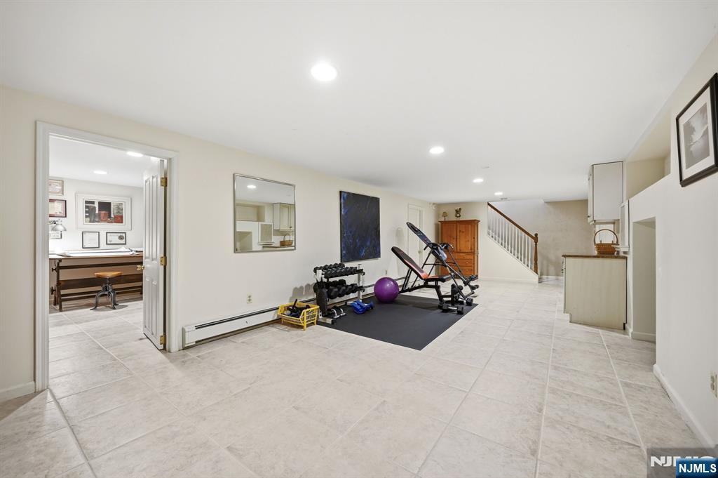 760 Rivenwood Road Franklin Lakes, NJ 07417 - Photo 28 of 48 a view of a room with gym equipment