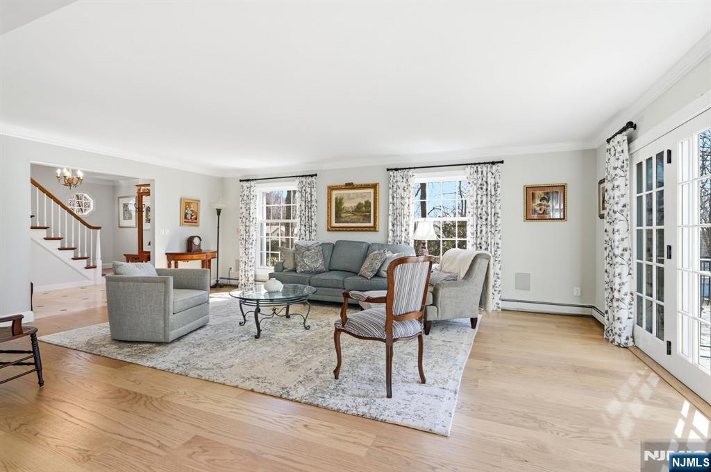 760 Rivenwood Road Franklin Lakes, NJ 07417 - Photo 6 of 48 a living room with furniture a dining table and a window