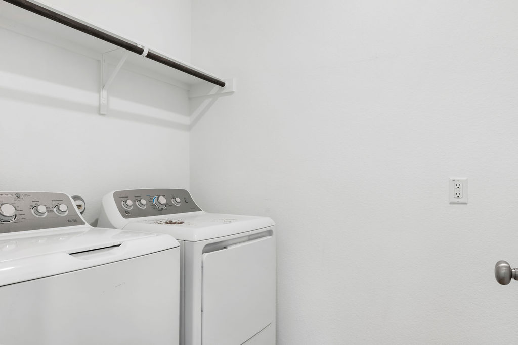 1205 Sweetspire Street Leander, TX 78641 - Photo 16 of 31 Washroom with washing machine and dryer