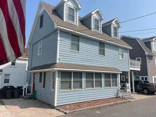 a house that has a window in front of it
