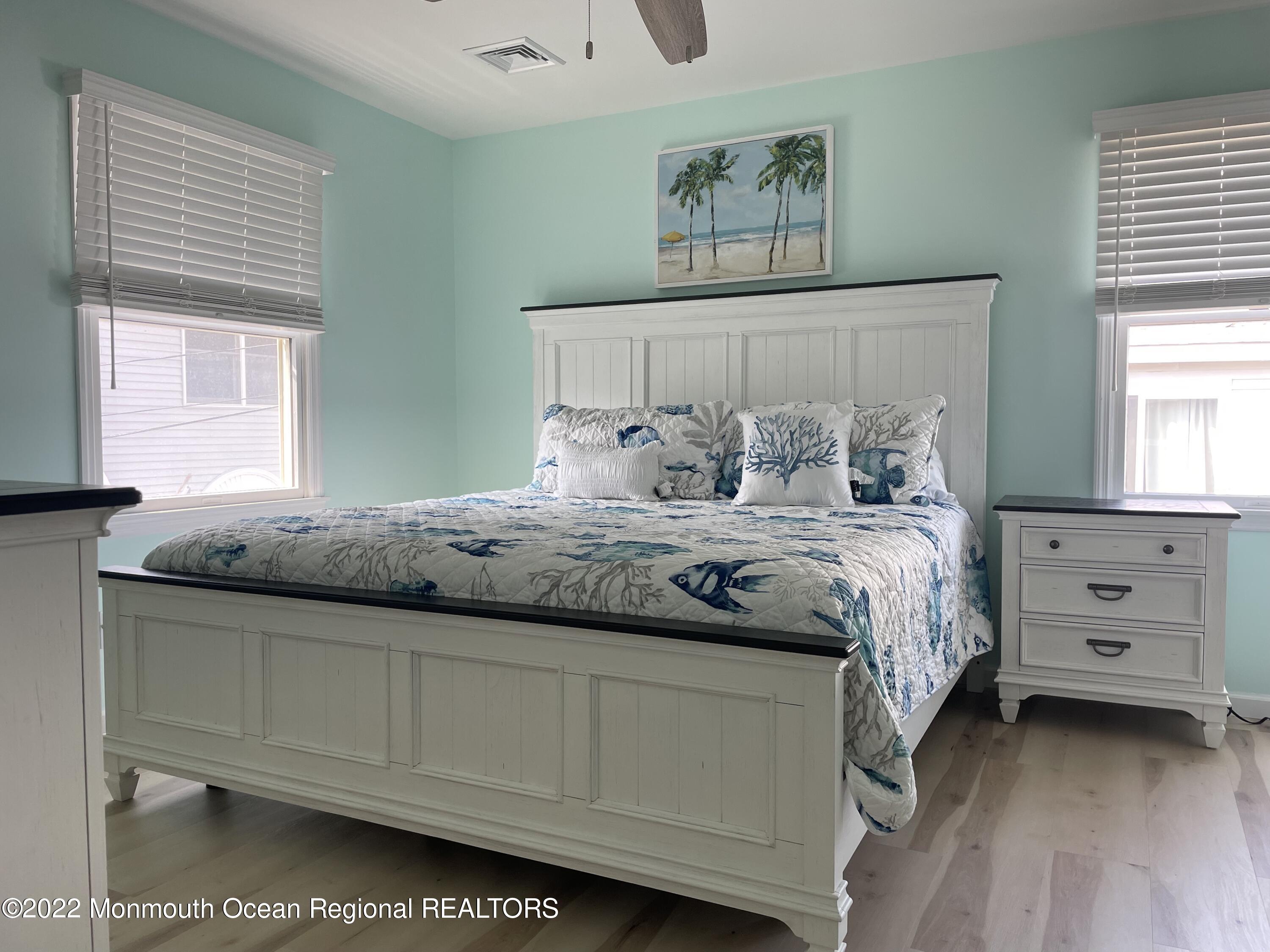 68 Pacific Way Lavallette, NJ 08735 - Photo 13 of 13 a bedroom with a bed and a window