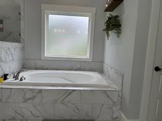 a bathroom with a bathtub