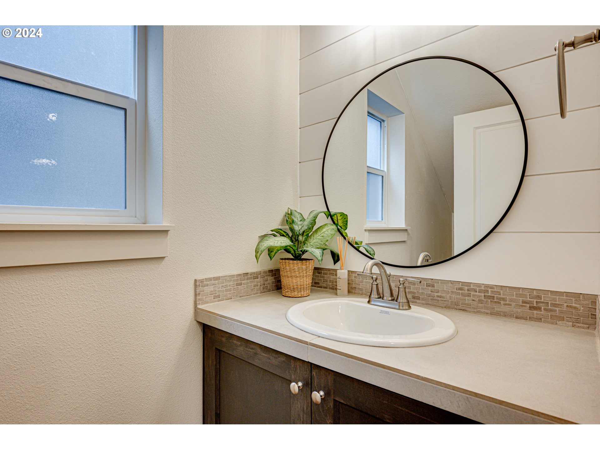 7252 South 13th Street Ridgefield, WA 98642 - Photo 11 of 29 a bathroom with a sink and a mirror
