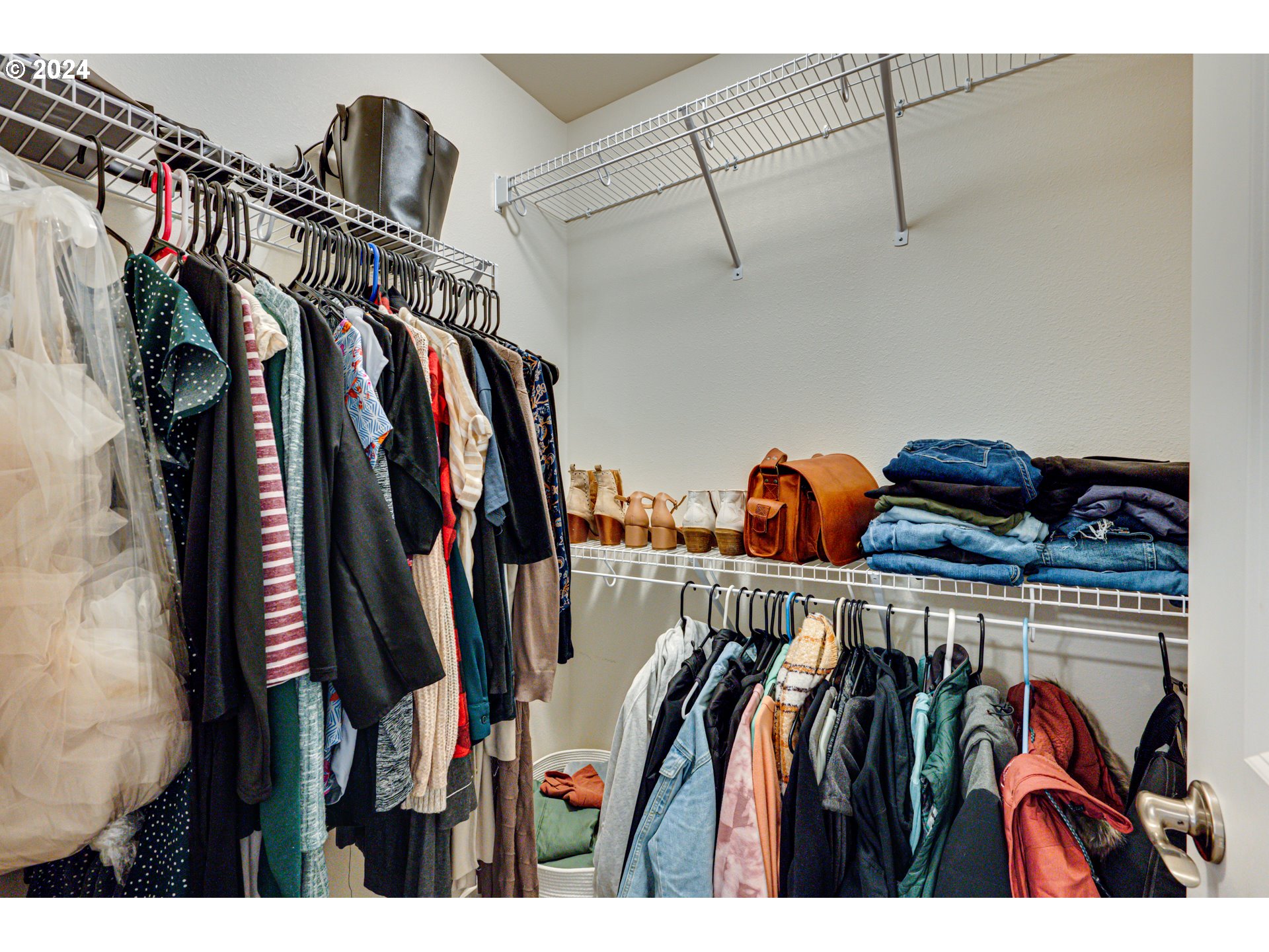 7252 South 13th Street Ridgefield, WA 98642 - Photo 16 of 29 a view of walk in closet with clothes and shoes