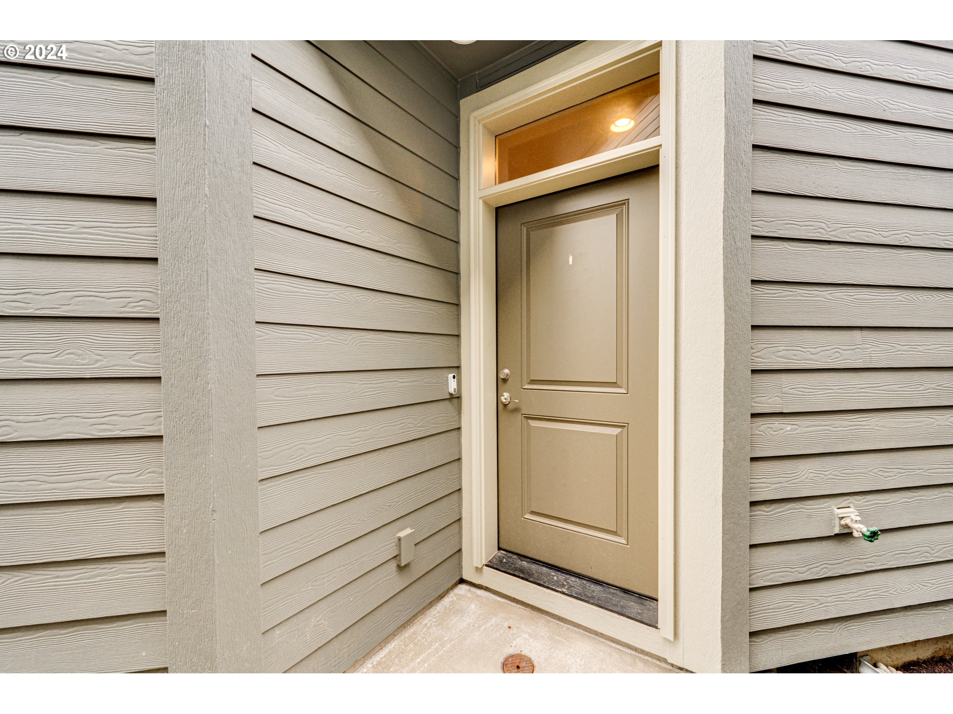 7252 South 13th Street Ridgefield, WA 98642 - Photo 2 of 29 a view of a wooden door and a window